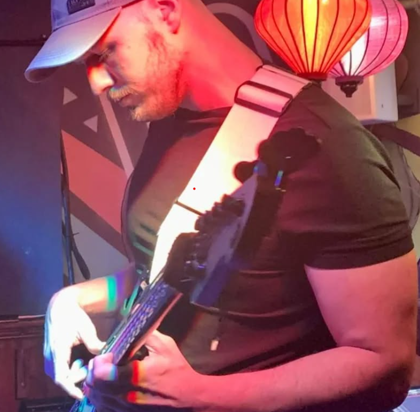 Jack Parkinson performing on guitar, professional music teacher in Crowland